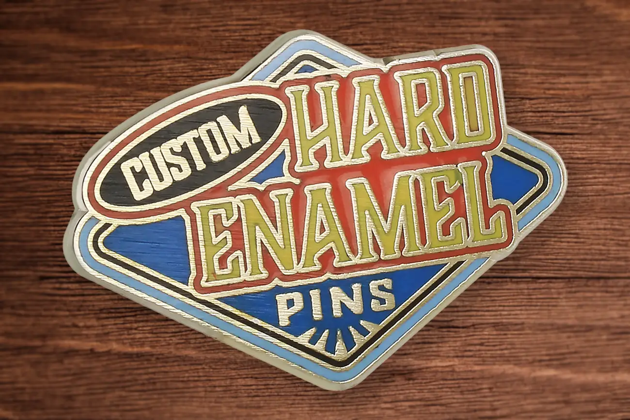 Closeup of the smooth metal surface of a hard enamel pin