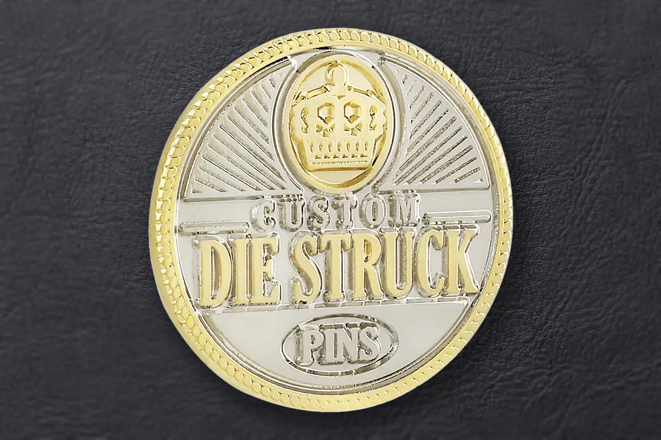 Closeup of the metal surface of a die struck pin