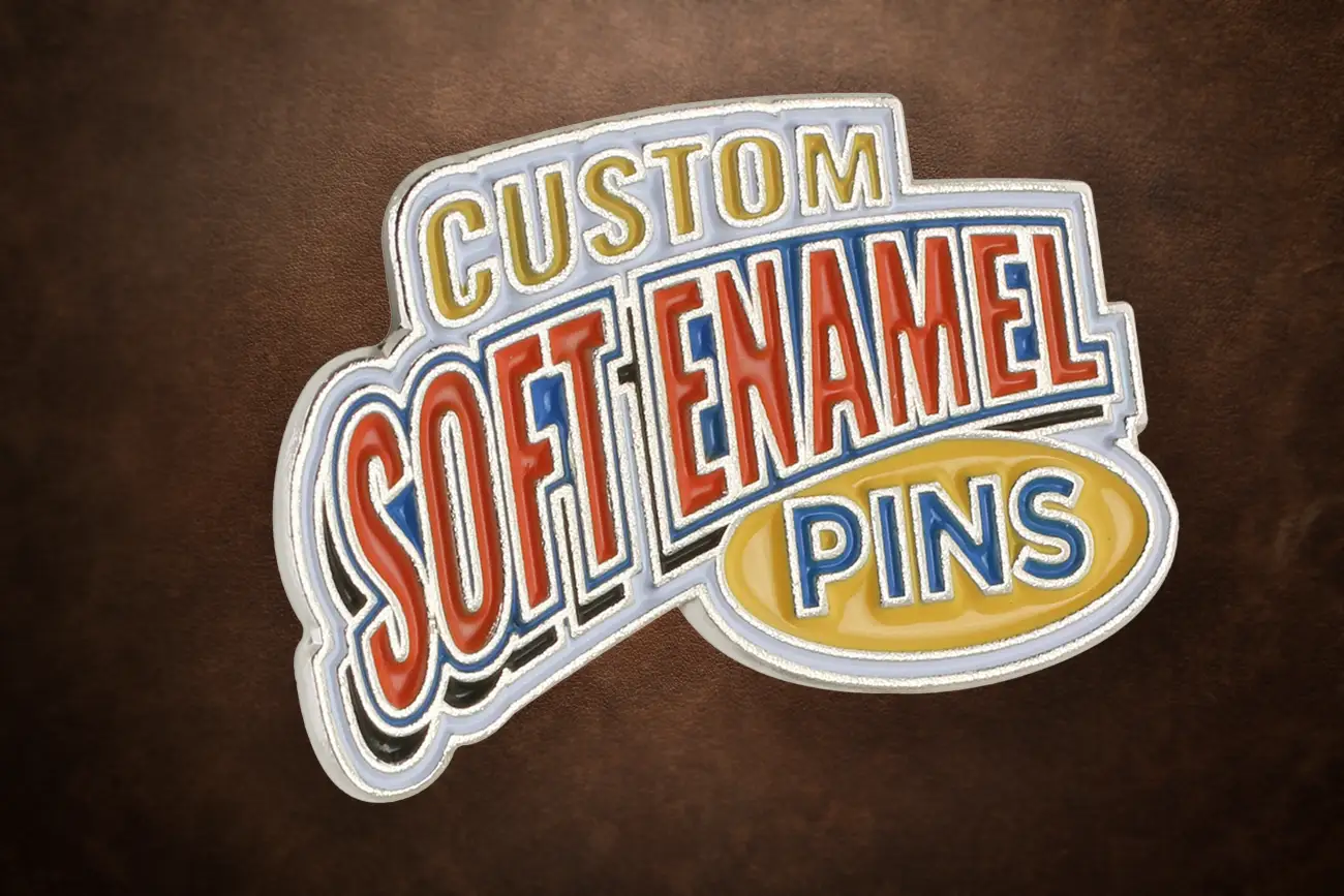 Closeup of the textured metal of a soft enamel pin